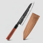 HEZHEN 8.5-inch chef knife with a hammered Damascus-style steel blade, a reddish-brown wood handle, and a matching wooden sheath, displayed on a white marble surface against a dark brown background with product text.